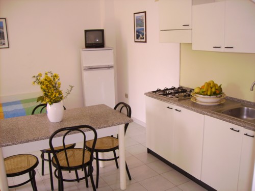 Soggiorno con Angolo Cottura Trilocale 6 posti Residence Baia d'oro Torre Mozza, Lecce