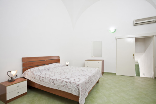 camera da letto di un appartamento Dimora San Vincenzo Gallipoli